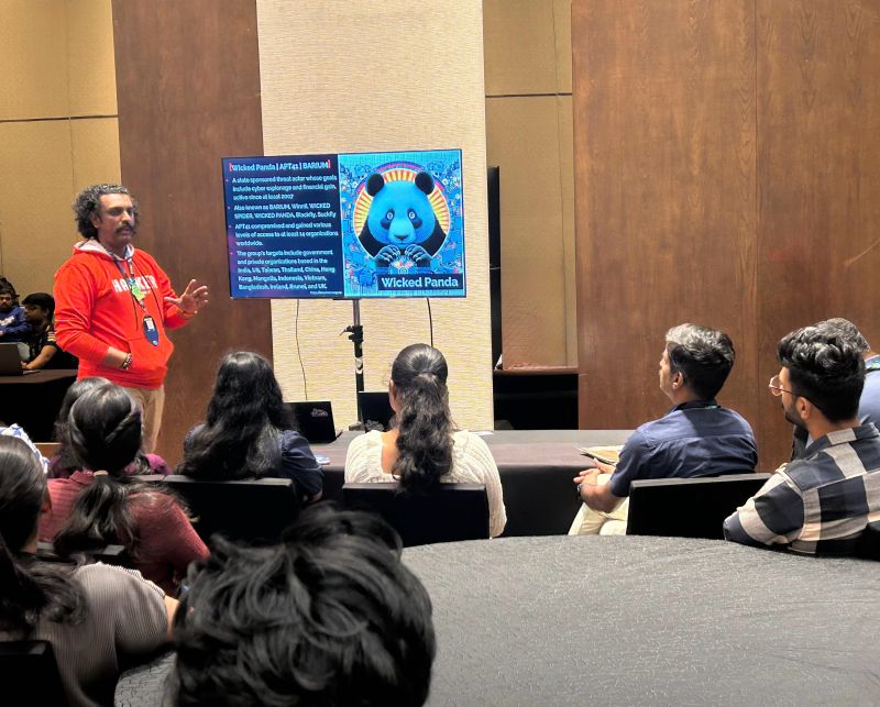Abhijith B R presenting threat actor trends at c0c0n 2025