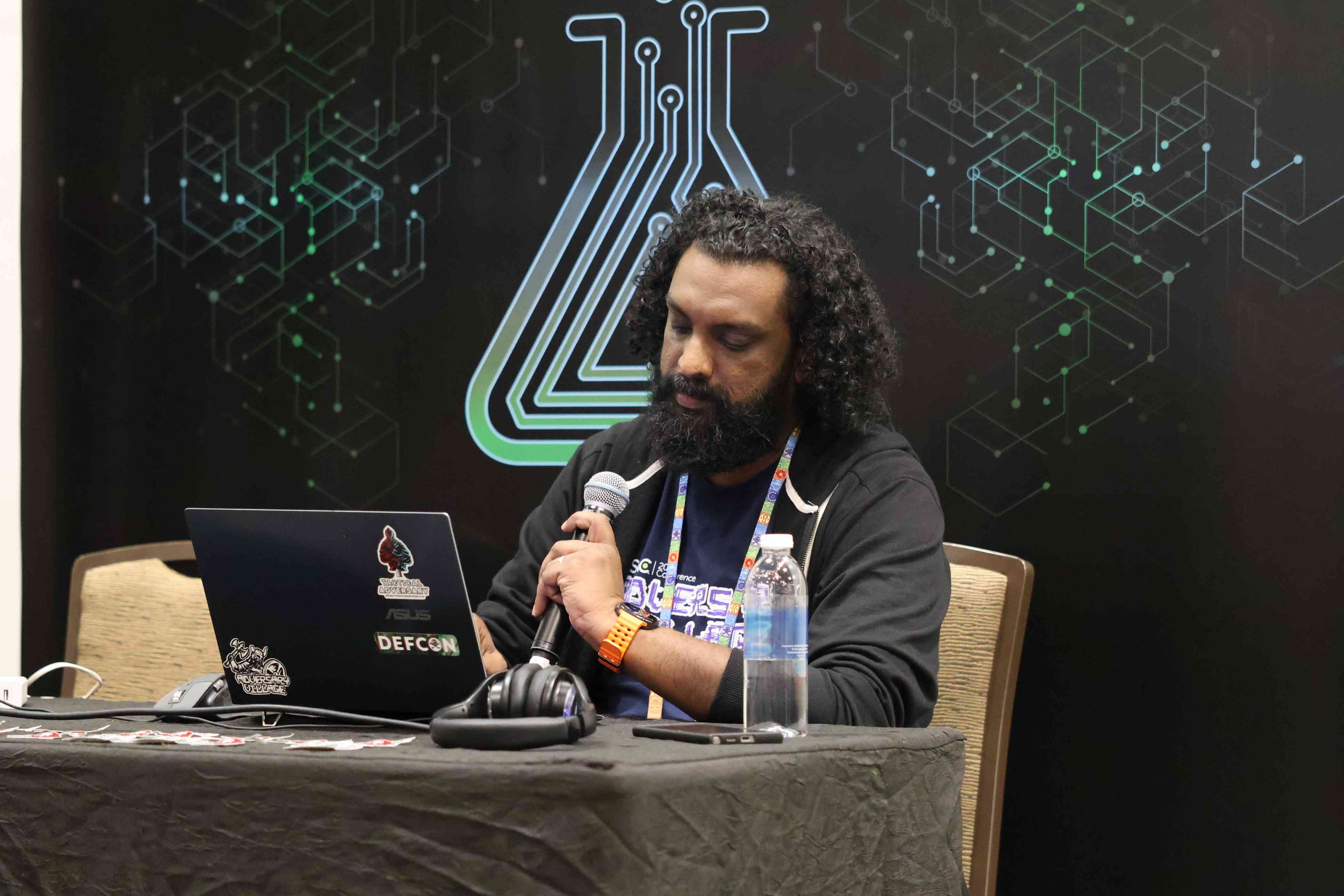Abhijith B R presenting RedTeamSimmer at DEF CON Singapore 2026 Demo Labs